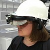 The head-mounted trackers, camera, and display that participants wore when taking part in the Three Angry Men dramatic experience
